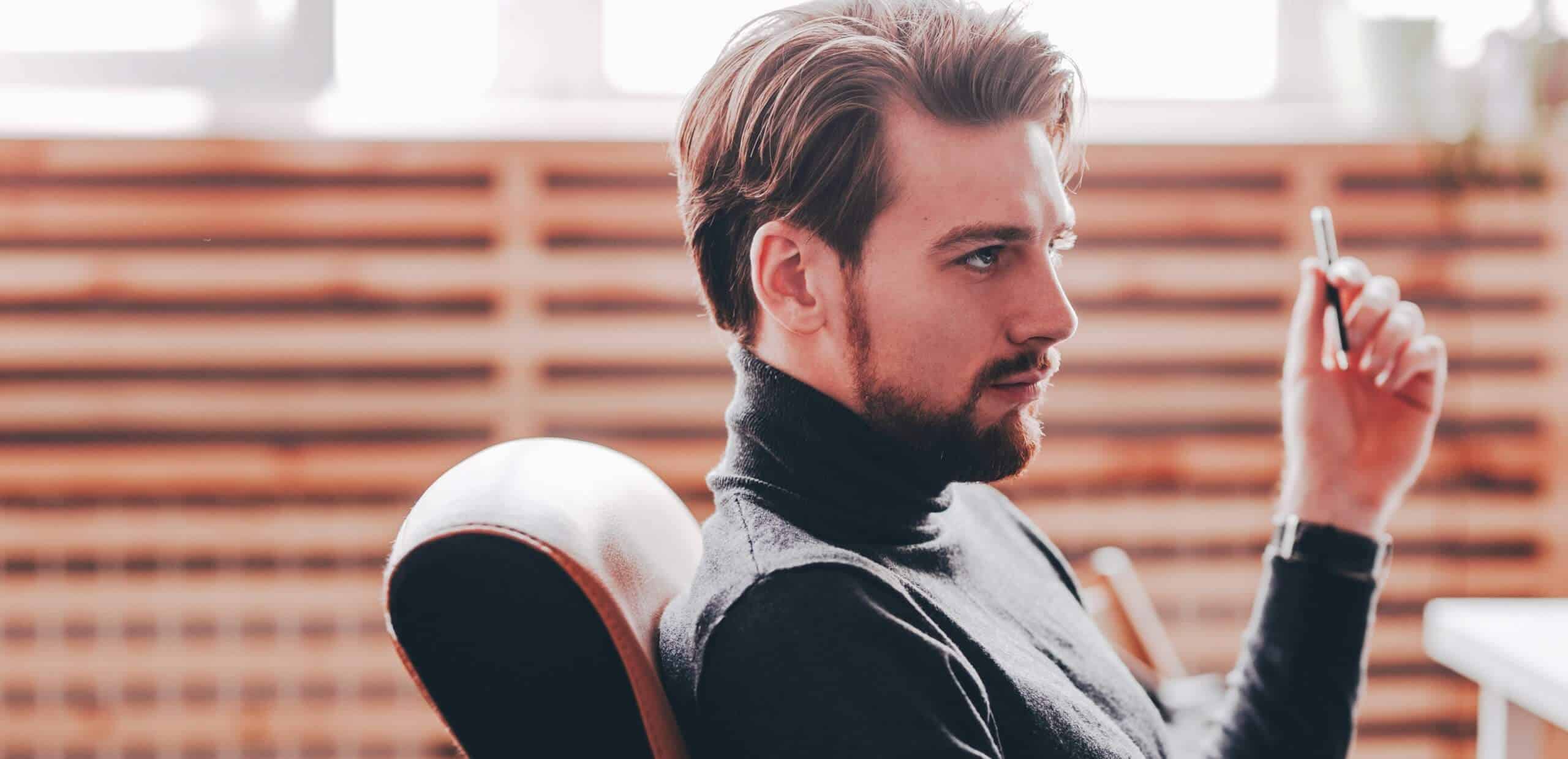 the-guy-dressed-in-casual-office-style-clothes-is-7QKGVLE_cropped